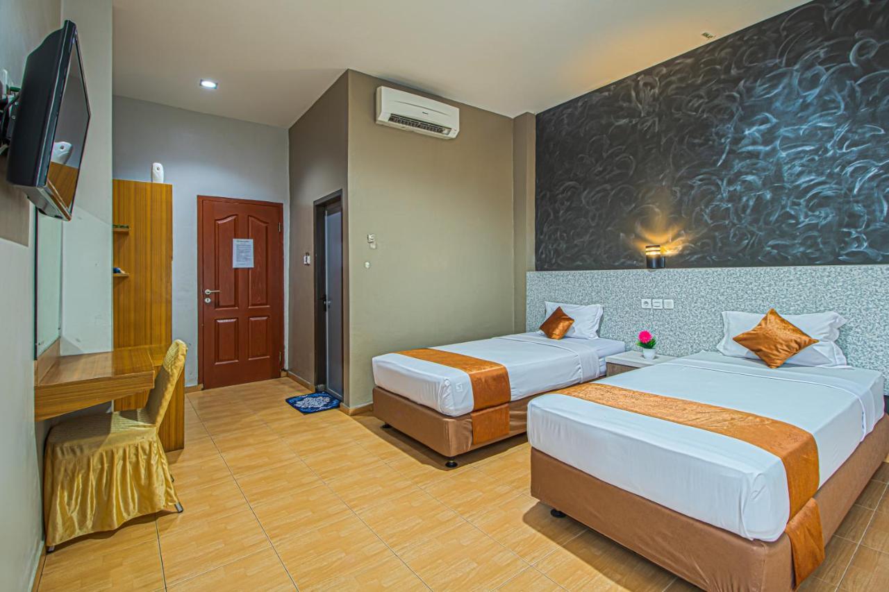 แกรนด์ อาเจห์ โฮเทล Hotel บันดาอาเจะห์ ภายนอก รูปภาพ